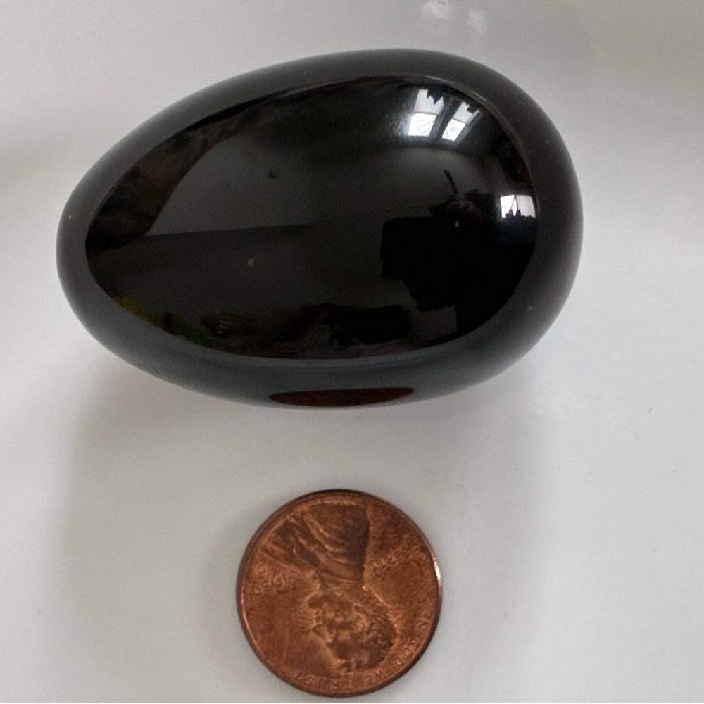 Medium obsidian crystal yoni egg for protection meditations.